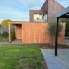 Douglas rhombusprofiel project Tongeren MAATWERK Moderne houtberging met overkapping